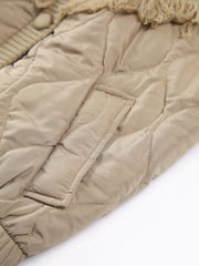 Luméa™ | Veste matelassée en tricot torsadé patchwork